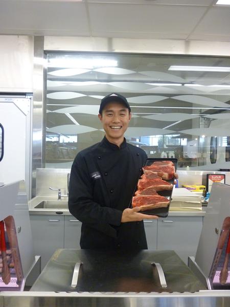 Liang Ma Checks Out Fresh Beef in the Ilam New World Butchery